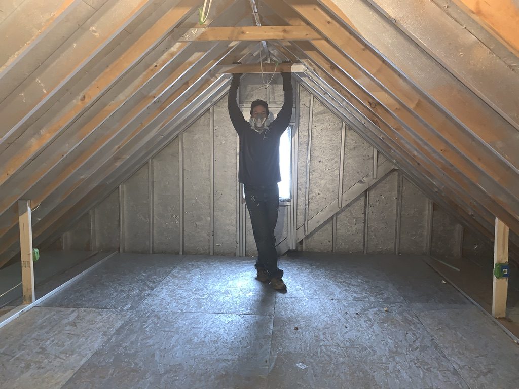 new attic room with spray on liquid foil