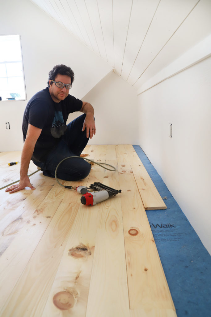 Installing the last rows of pine floor in the attic office