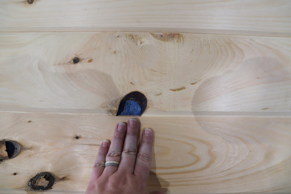 Knots in the solid pine flooring