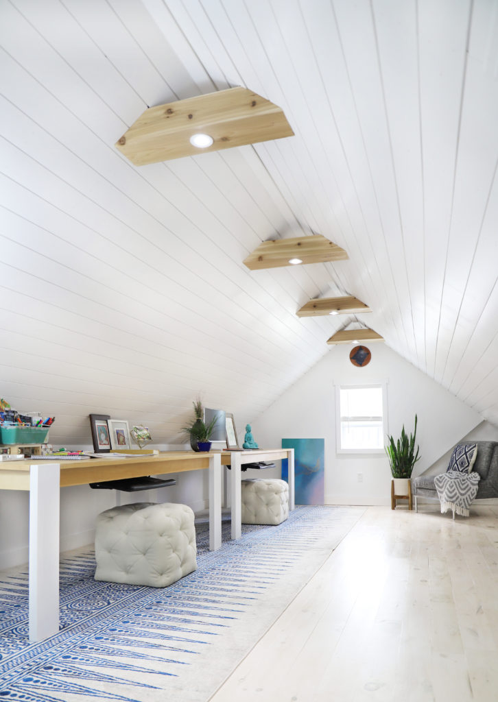 Modern whitewashed wood floors in the attic office