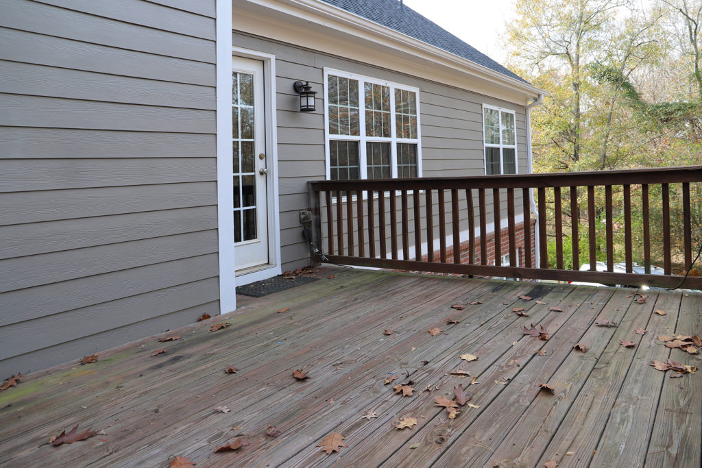 Back deck before refinishing algae and faded stain