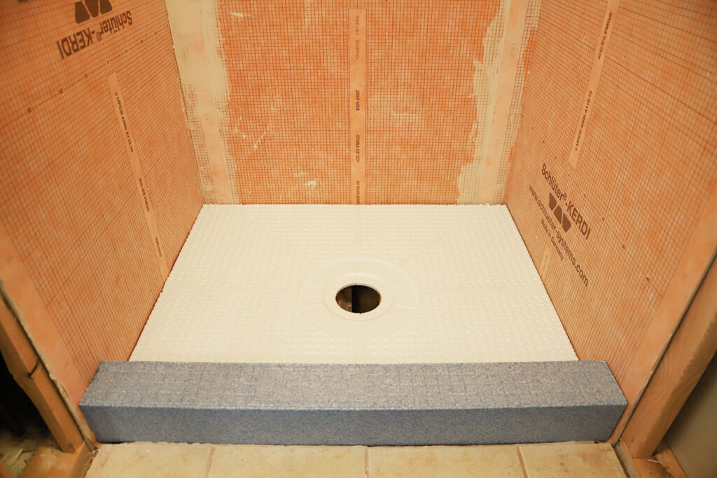 Schluter-Kerdi membrane shower with styrofoam curb and shower pan