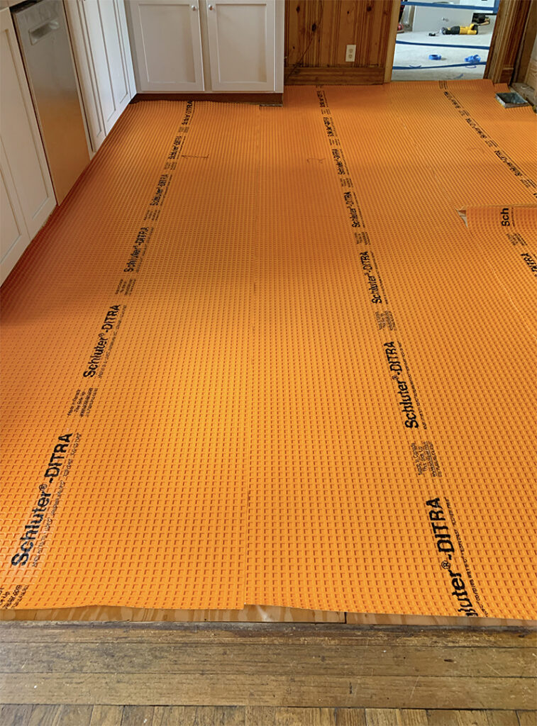 Schluter Ditra waterproof uncoupling membrane in kitchen floor