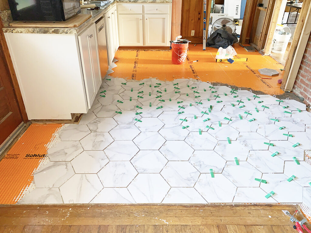installing hexagon tile in kitchen with wedges and spacers